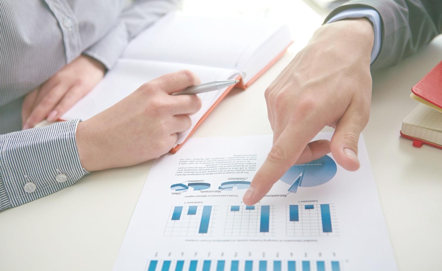 Students working on testing projects with modern development tools and equipment